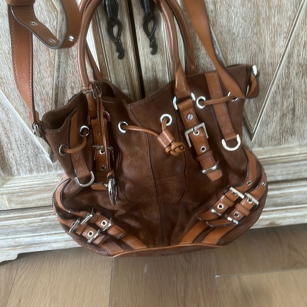 Michael Kors suede and leather purse with pockets on the inside